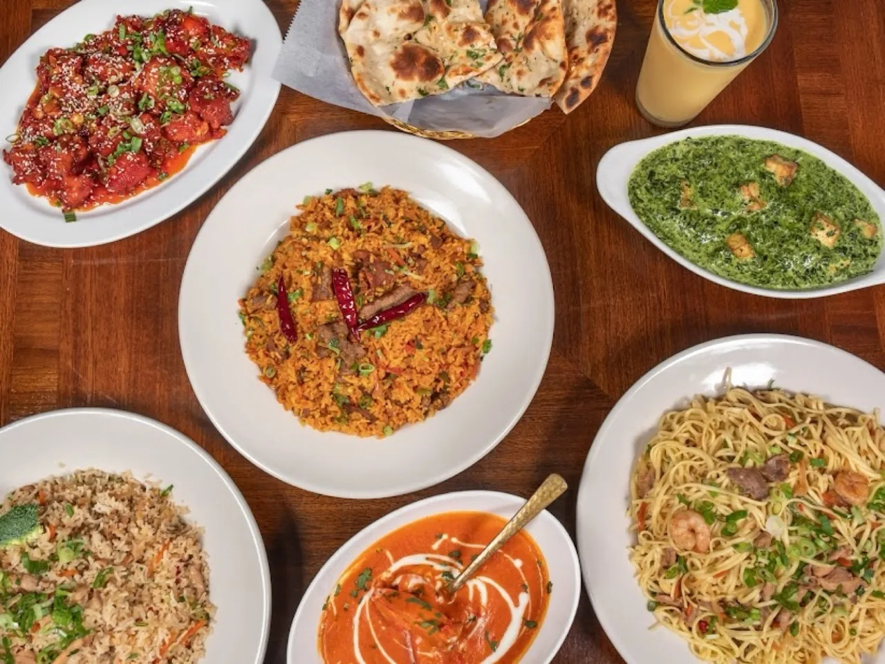 Halal iftaar spread with naan, curries and rice from Wok & Karahi, Spring TX